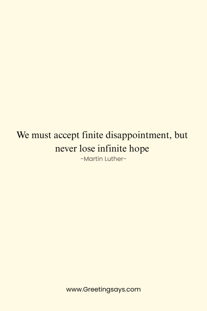 Minimalist cream background with an inspirational quote in the center reading, “We must accept finite disappointment, but never lose infinite hope” by Martin Luther, with the website Greetingsays.com at the bottom.